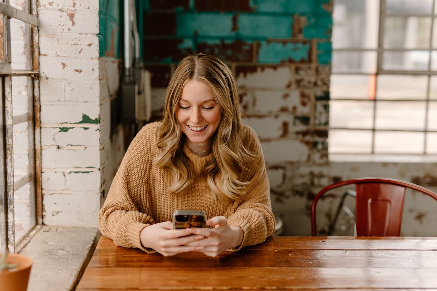 Person exploring rentals on a smartphone